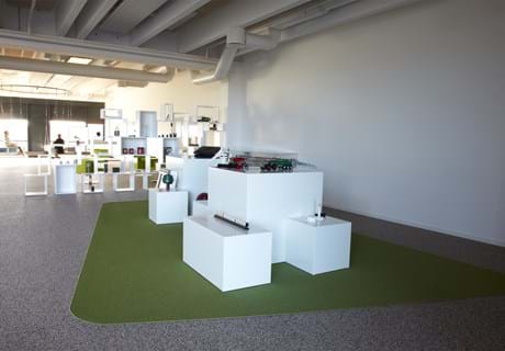 afpasset Fraster tæppe grøn på kontor